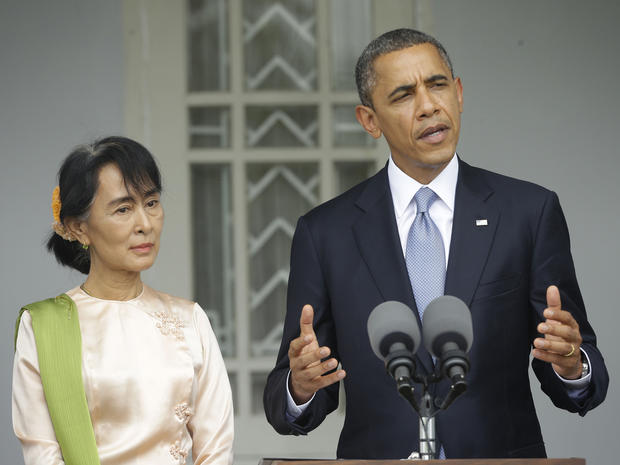 President Obama, accompanied by Burmese opposition leader Aung San Suu Kyi, addresses members of the media at Suu Kyi's residence in Yangon, Monday, Nov. 19, 2012. 