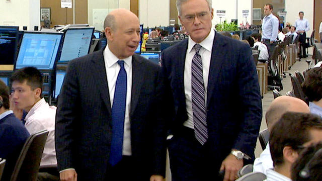 Goldman Sachs CEO Lloyd Blankfein and CBS News' Scott Pelley tour one of the bank giant's trading rooms. 