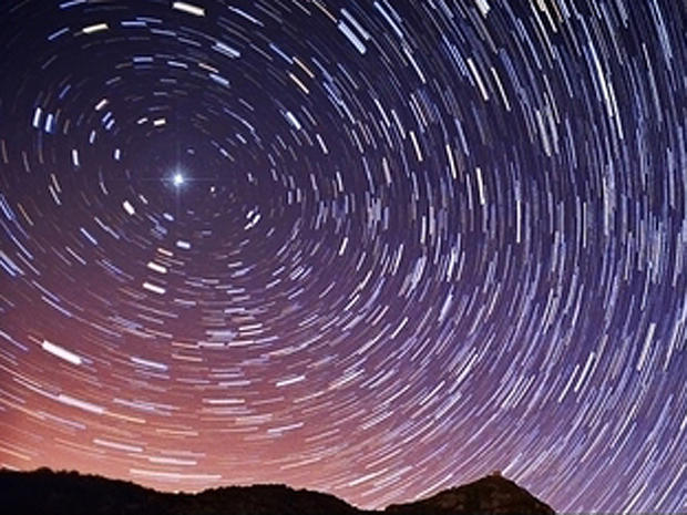 This long-exposure photo shows how the North Star, Polaris, stays fixed in the night sky as other stars appear to move during the night due to Earth's rotation. 