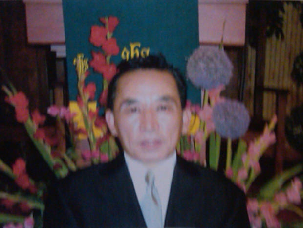 Picture Of Victim Ki-Suck Han, Held By His Widow Dec. 5, 2012 