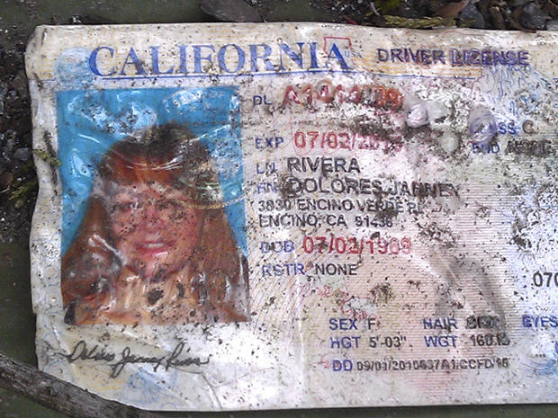 Jenni Rivera's driving license is seen of the ground at the crash site where a plane crashed near Iturbide, Mexico, on Dec. 12, 2012. 