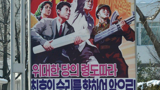 poster with slogan which reads " Advance toward the final victory " in Pyongyang, North Korea Sunday, Dec. 9, 2012.  