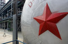 A red star fronts a pressure tank on May 25, 2005, at the Yanlian Oil Refinery in China. 