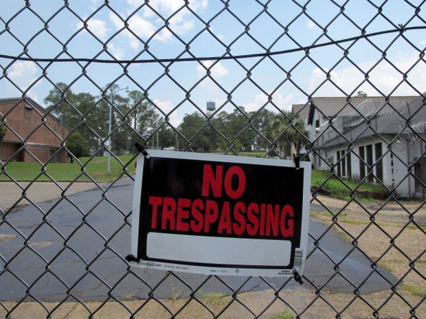 In this July 13, 2011 photo, the buildings that housed the Dozier School for Boys is locked after if closed.