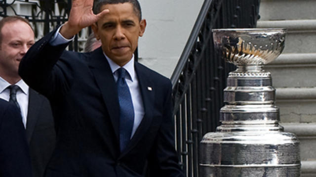president-barack-obama-with-nhls-stanley-cup.jpg 
