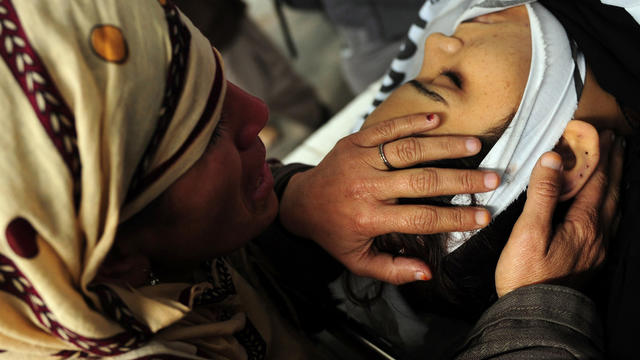 A Pakistani mother mourns her daughter, who was killed working for a polio vaccination program  