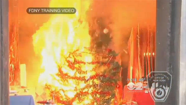 This snapshot from the FDNY's training video shows how live Christmas trees can be "combustible" when cloaked in decorations. 