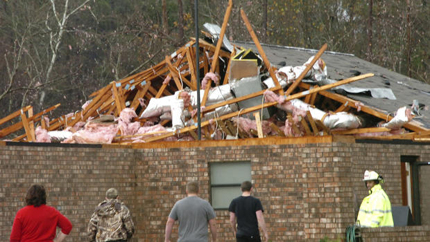 A house in Tioga, La., is severely damaged after an apparent tornado tore through the area Tuesday, Dec. 25, 2012. 