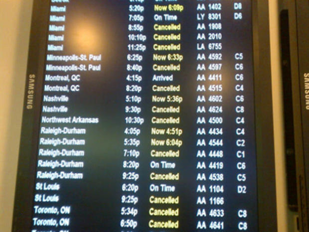 Flight Status Board At LaGuardia Airport 