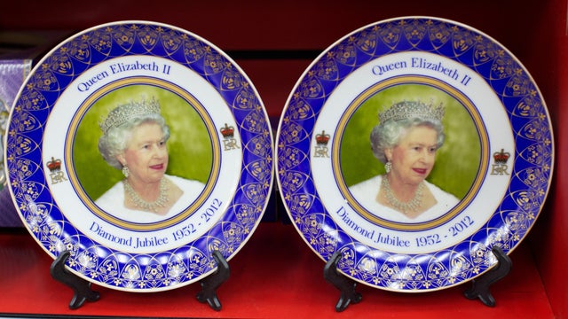 Diamond Jubilee souvenir plates featuring Britain's Queen Elizabeth II 