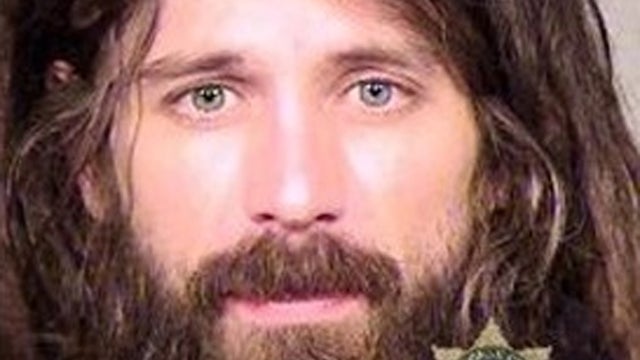 Caleb Grotberg, 32, of Portland, Oregon, was arrested for allegedly choking his girlfriend with his gridlocks Jan. 7, 2013, say Portland police. 
