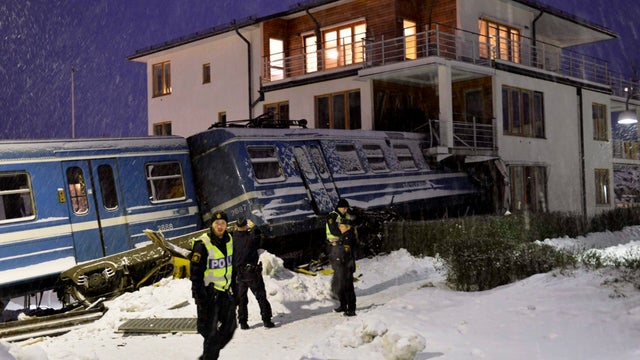 Sweden train crashes into home 
