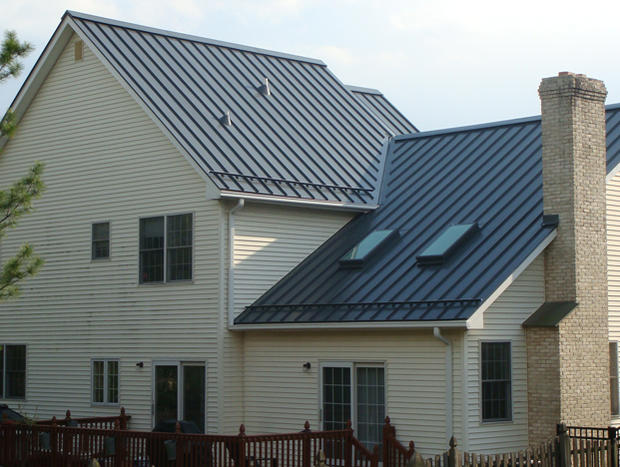traditional-home-gets-a-modern-metal-roof.jpg 