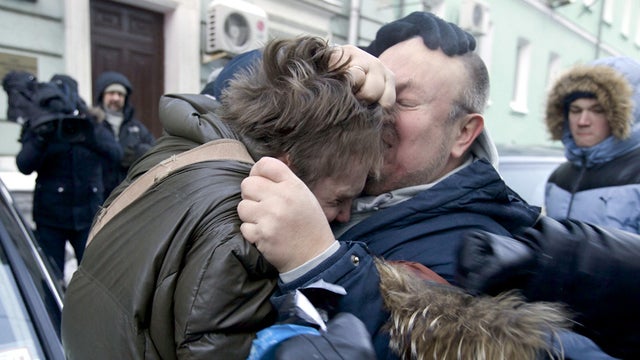 An Orthodox activist, right, reacts with a gay rights campaigner, during a protest outside of State Duma, Russian Parliament's lower chamber, in downtown Moscow, Russia, on Tuesday, Jan. 22, 2013.  