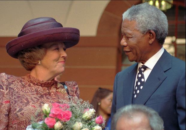 Dutch Queen Beatrix, left, talks with South African President Nelson Mandela Monday, September 30, 1996 in Pretoria after an arrivals ceremony. Queen Beatrix is the first ever member of the Dutch Royal Family to visit South Africa. 