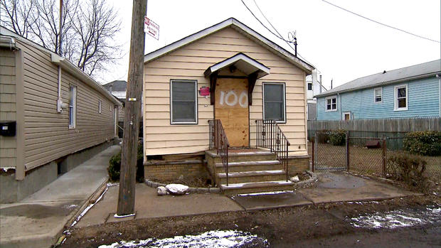 A picture of a house heavily damaged by superstorm Sandy on Staten Island, 100 days after the storm hit. 