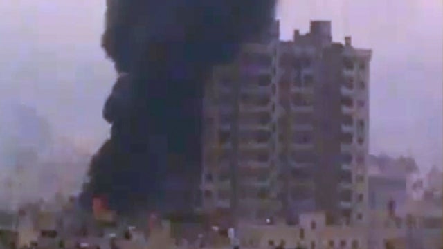 Smoke rises from the scene of a bomb blast in Damascus 