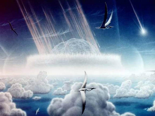 An artist's impression of a giant space rock slamming into Earth 65 million years ago near what is now Mexico's Yucatan Peninsula. A consortium of scientists now says this was indeed what caused the end of the Age of Dinosaurs. 