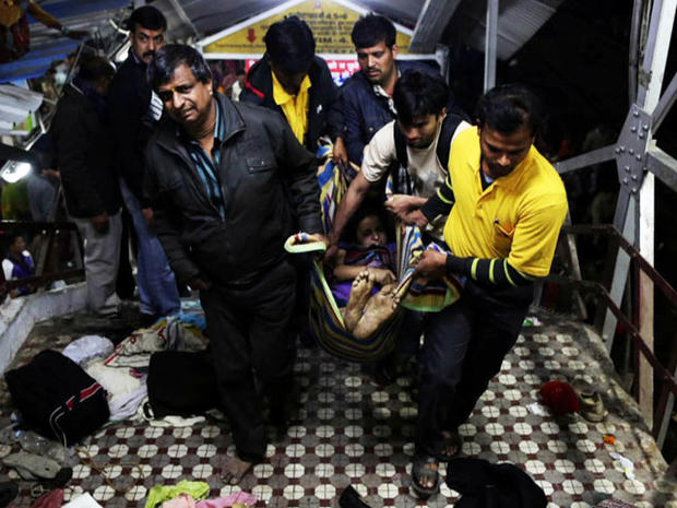 At least 30 people were crushed to death in a stampede as pilgrims tried to board a train. 
