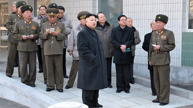 North Korean leader Kim Jong-Un (center) visits the Taesongsan General Hospital 