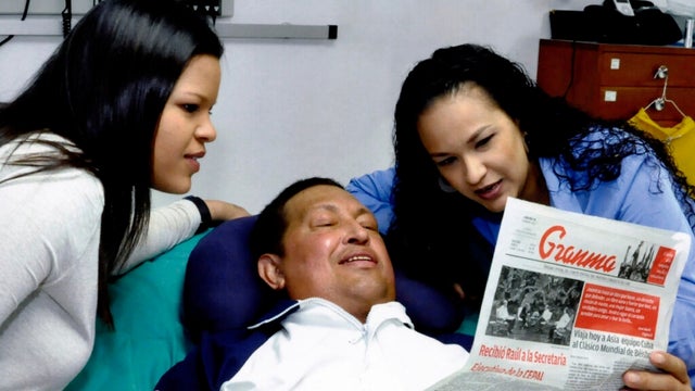 Hugo Chavez with his daughters, Maria Gabriela, left, and Rosa Virginia 