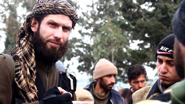 Suqur al-Sham brigade commander Ayachi Abdel Rahman, who orchestrated the mission, gives orders to his men before heading into their positions Sunday afternoon. 