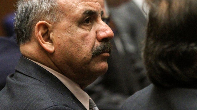 Oscar Hernandez, former mayor of Bell, Calif., listens to closing arguments in a massive city corruption trial in a downtown Los Angeles courtroom Feb. 20, 2013. 