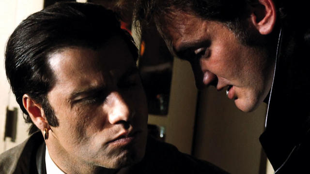 Actor John Travolta and director Quentin Tarantino on the set of "Pulp Fiction" 