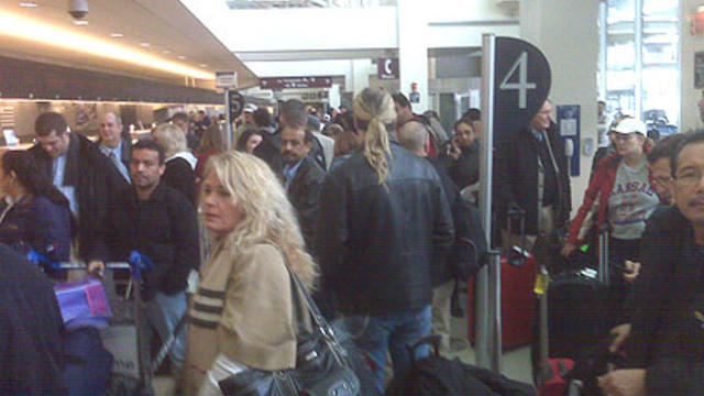 airline-passengers-waiting-madden.jpg 