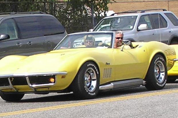 Joe and Tina Caronna driving their 1969 yellow Corvette for a 2008 fundraiser just a few months before Tina's murder. 