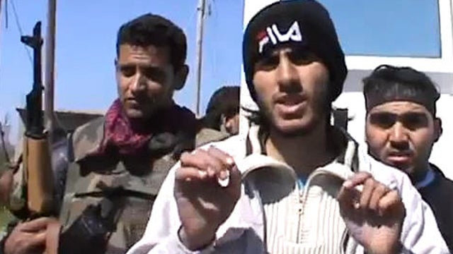 Armed fighters claim to have detained a group of U.N. peacekeepers in a video posted to YouTube March 6, 2013. 