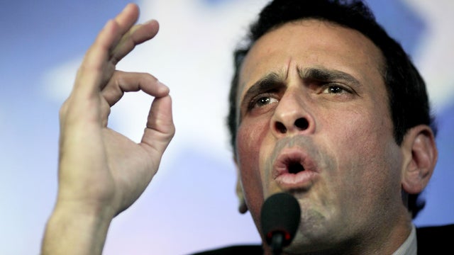 Opposition leader Henrique Capriles gestures during a press conference in Caracas, Venezuela, Sunday, March 10, 2013. Capriles announced he will run in elections, scheduled for April 14, to replace late President Hugo Chavez, who died of cancer on March 5 