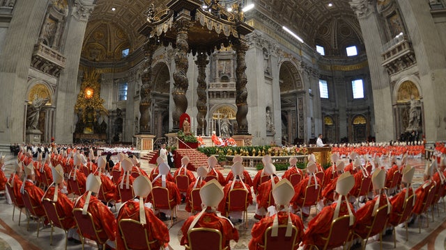Cardinals attend a mass at the St Peter's basilica before the start of the conclave on March 12, 2013 at the Vatican. Cardinals moved into the Vatican today as the suspense mounted ahead of a secret papal election with no clear frontrunner to steer the Ca 