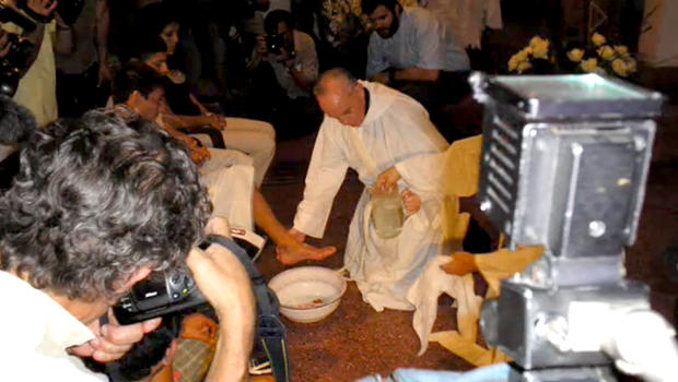 This screengrab from a YouTube video uploaded in 2008 shows then-Cardinal Jorge Mario Bergoglio. According to its author, Bergoglio was washing the feat of drug addicts in Buenos Aires. 