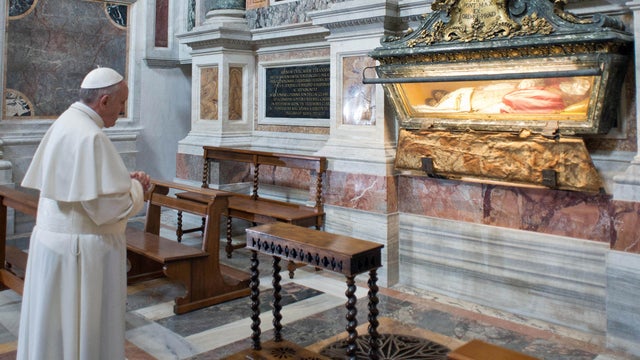Pope Francis prays inside St. Mary Major Basilica 