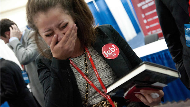 Rebecca McLaughlin, wearing a Jeb '16 sticker, cries after meeting former Florida governor Jeb Bush and his signing the book 'Immigation Wars' which he co-authored with Clint Bolick at a book signing during the Conservative Political Action Conference (CPAC) in National Harbor, Maryland, on March 15, 2013. 