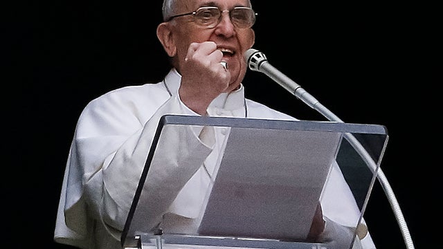 Pope Francis gestures as he delivers his Angelus prayer 