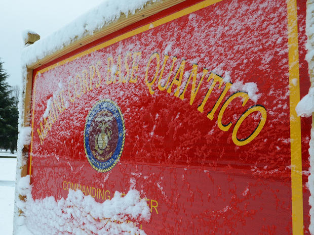 Image provided by U.S. Marine Corps shows snow covering one of Marine Corps Base Quantico»??s many signs March 6, 2013 