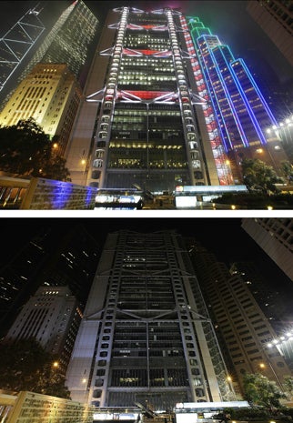 In this composite image, Hong Kong buildings, with the HSBC building in the middle, are seen before and after the lights were switched off to recognize Earth Hour March 23, 2013.