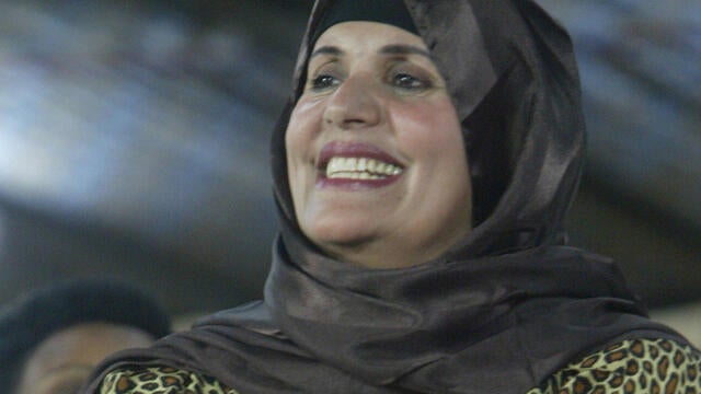 The widow of the late ruler Moammar Gadhafi, Safiya Gadhafi, pictured on September 1st, 2003, at a military parade in Tripoli, Libya.  