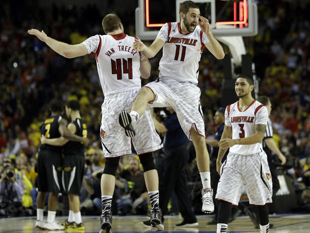 Louisville's Luke Hancock (11), Louisville's Peyton Siva (3) and Louisville's Stephan Van Treese (44) react after the second half of a NCAA Final Four tournament college basketball semifinal game against Wichita State April 6, 2013, in Atlanta. Louisville 