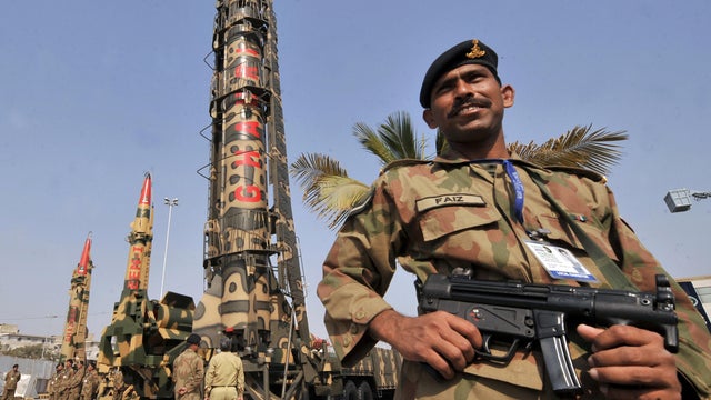 Pakistani soldiers guard nuclear-capable missiles at the International Defense Exhibition in Karachi, Pakistan, Nov. 27, 2008. 