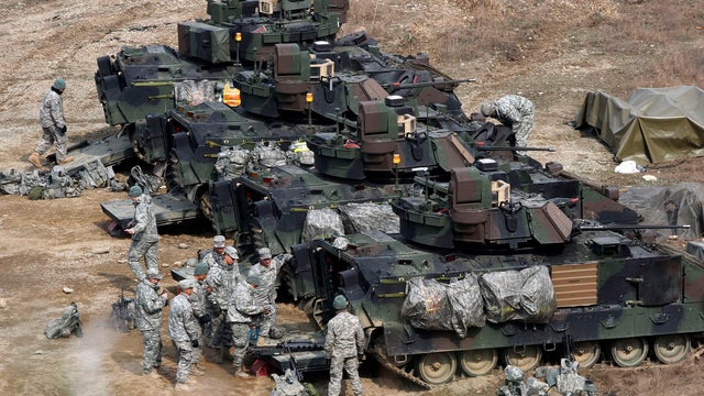 U.S. Army soldiers prepare for an exercise during annual military drills in Yeoncheon, South Korea, near the border with North Korea, Tuesday, April 9, 2013. 