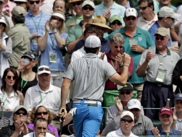 Rory McIlroy, of Northern Ireland, holds up his ball after putting on the sixth green during the second round of the Masters golf tournament April 12, 2013, in Augusta, Ga. 
