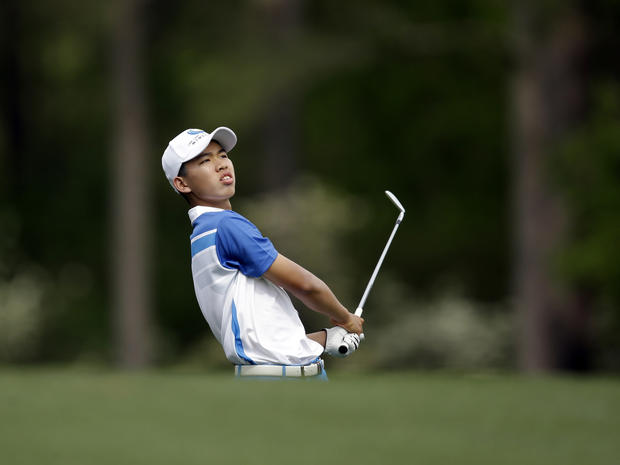 Amateur Guan Tianlang, of China, watches his shot off the 12th fairway during the first round of the Masters golf tournament April 11, 2013, in Augusta, Ga. 
