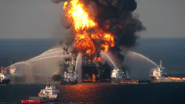 In this handout image provided be the U.S. Coast Guard, fire boat response crews battle the blazing remnants of the off shore oil rig Deepwater Horizon in the Gulf of Mexico on April 21, 2010 near New Orleans, Louisiana.   