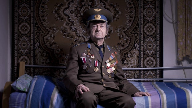 In this photo made on Friday, April 12, 2013, Soviet Jewish World War veteran Aharon Kavishaner poses for a portrait at his house in the southern Israeli city of Ashkelon. Kavishaner joined the Red Army in 1942, as an air force mechanic and served in the 4th Ukrainian Front, a Soviet army group. Kavishaner immigrated to Israel in 1991. 