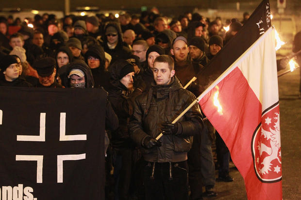Neo-Nazis and their sympathizers march with torches to commemorate the World War II firebombing of Dresden by Allied planes on February 13, 2012 in Dresden, Germany. Civil rights activists sought to surround the expected 1,500 neo-Nazis with a human chain 