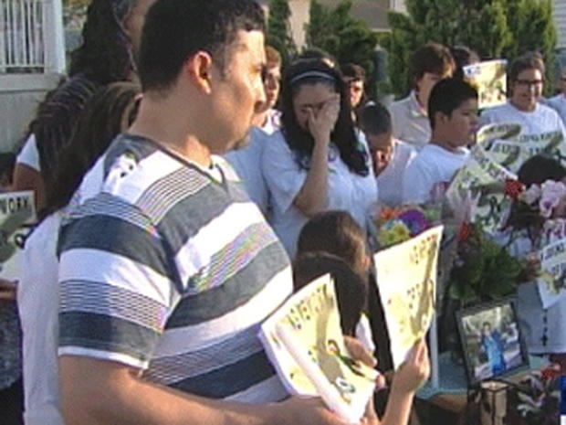 Family and friends of Ricardo Portillo hold vigil for him on front lawn of his Utah home on May 5, 2013 after soccer ref in rec league died from injuries suffered when he was  punched in head by angry teen goalie 