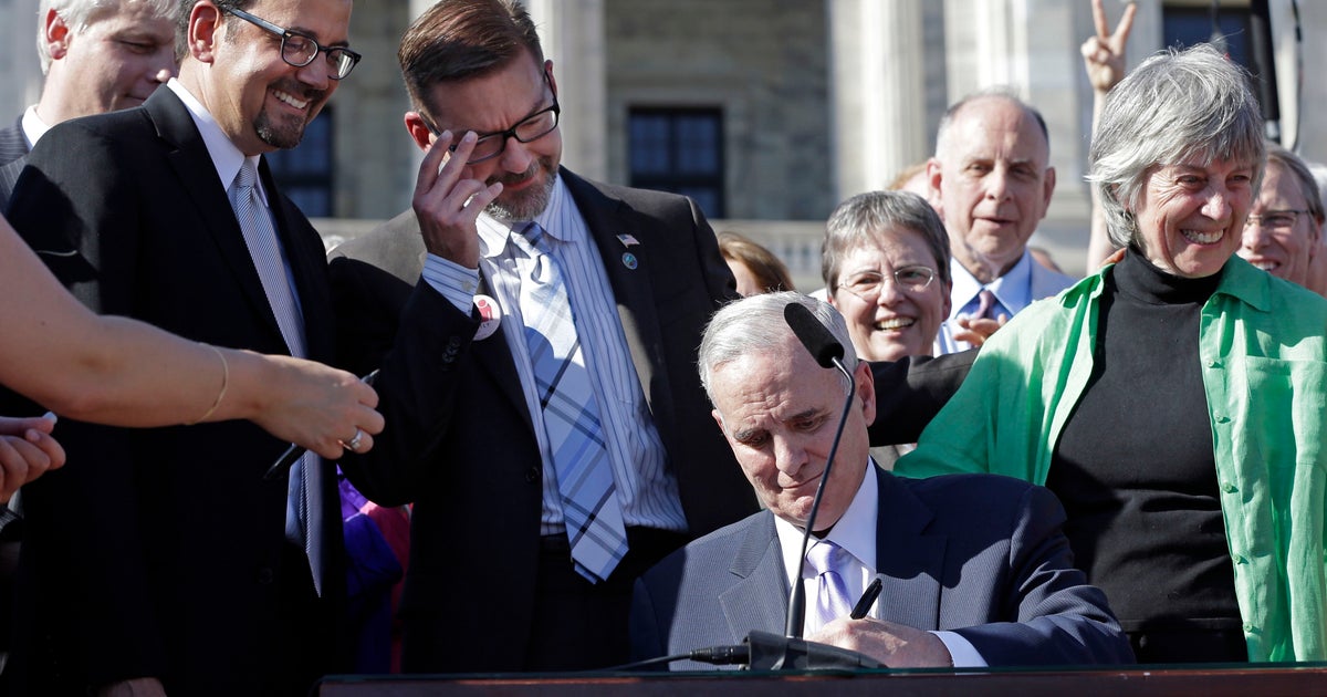 Minnesota governor signs same-sex marriage bill - CBS News
